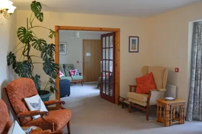 Living room through to  the library